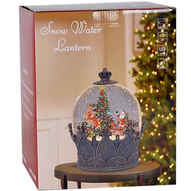 Snow globe lamp on a stand, bronze, with Santa in a sleigh with a reindeer by a tree, musical