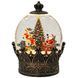Snow globe lamp on a stand, bronze, with Santa in a sleigh with a reindeer by a tree, musical
